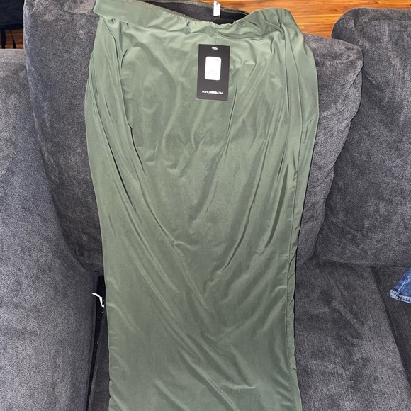 Fashion Nova Dresses & Skirts - Brand new olive fashion nova long skirt.Tight at the bottom,super cute & stylish